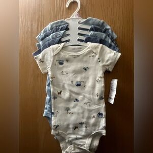 Carters 5 pack, baby onesie multiple prints